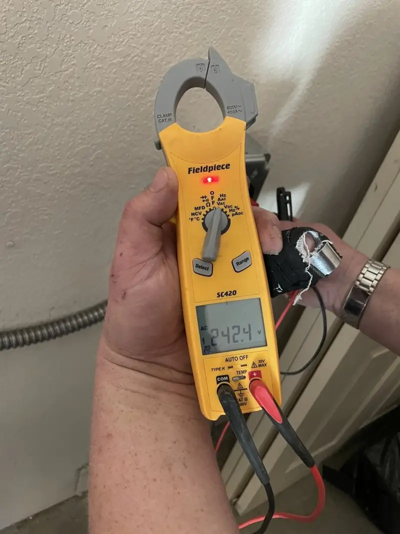 Voltage testing with clamp meter during Generator Installation in Wauwatosa